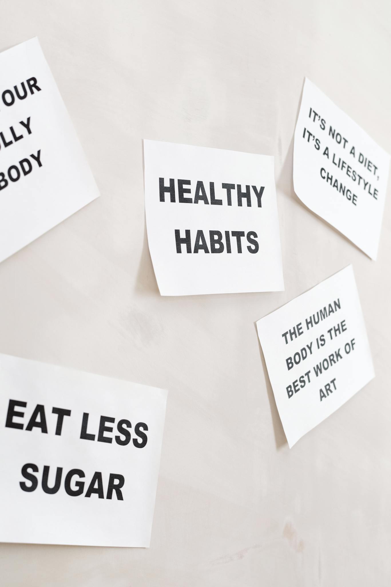 Wall with motivational slogans promoting a healthy lifestyle and body positivity.